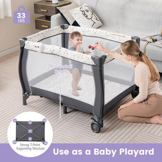 Portable Baby Playard with Changing Table Bassinet and Music Box-Multicolor