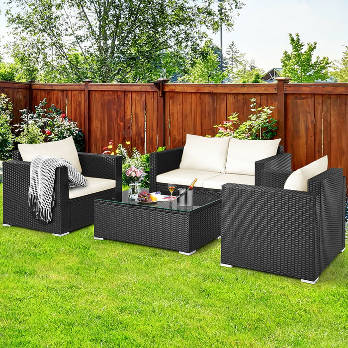 4 Pieces Patio Rattan Conversation Set with Padded Cushion and Tempered Glass Coffee Table-White